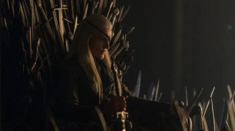 Aemond Targaryen main villain season 3 — Ewan Mitchell as Aemond Targaryen on the Iron Throne as the de facto main antagonist of House of the Dragon season three, HBO